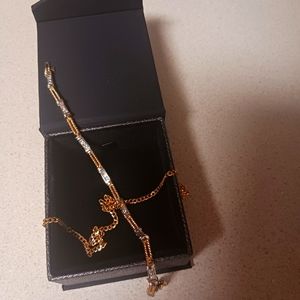 2 toned Diamond/Gold Bracelet(18karat). Gold chain (14karat)